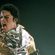Michael Jackson performs on stage during is “HIStory” world tour concert November 10, 1996 in Auckland, New Zealand.